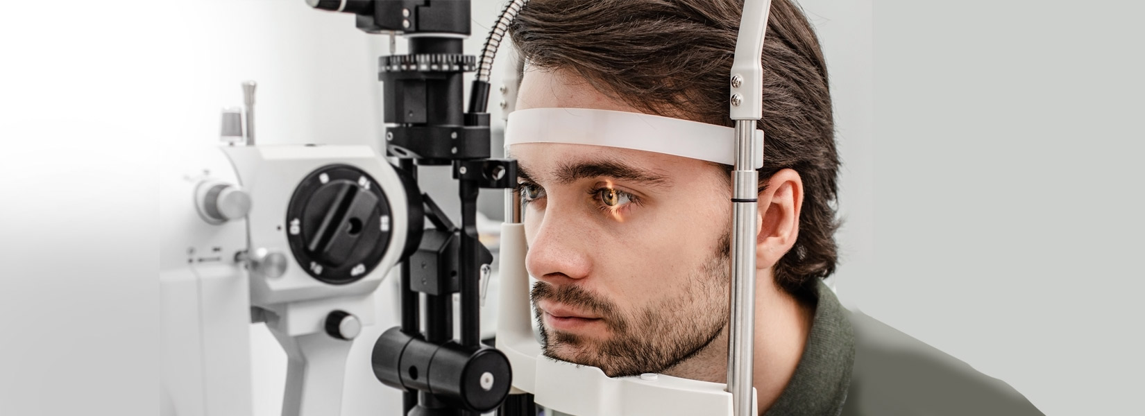 young man during eye exam in Kent